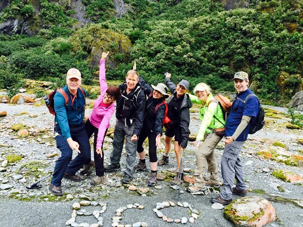 BCO members having fun. BCO spelled in rocks on the sand.